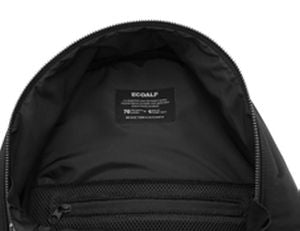 You can see the inside of the backpack with the manufacturer's label and an inner compartment