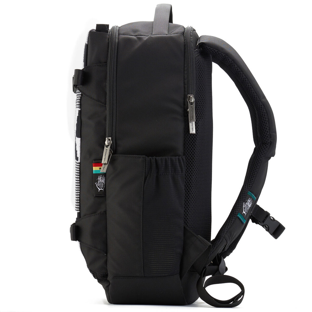 Black backpack with zips in side view