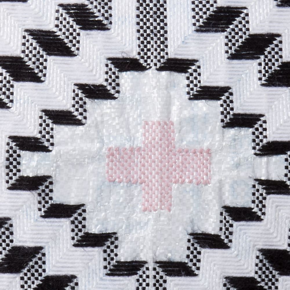 Black and white pattern, with a pink cross in the centre