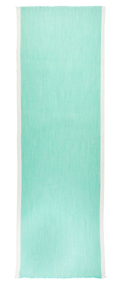 turquoise scarf with small fringes at the ends
