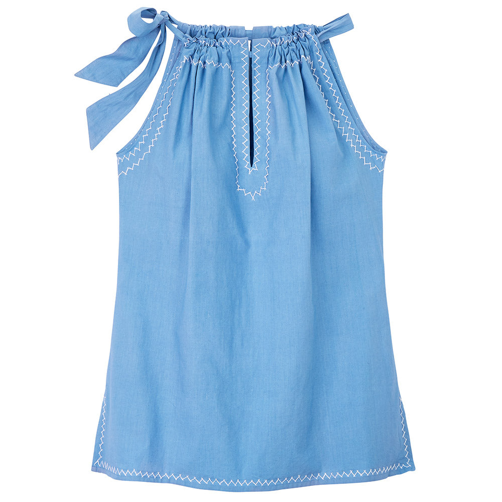 Light blue halterneck top with slit at the front and white zigzag embroidery on the sleeves and neckline.