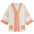 weiße Blusenjacke mit orangefarbener Stickerei