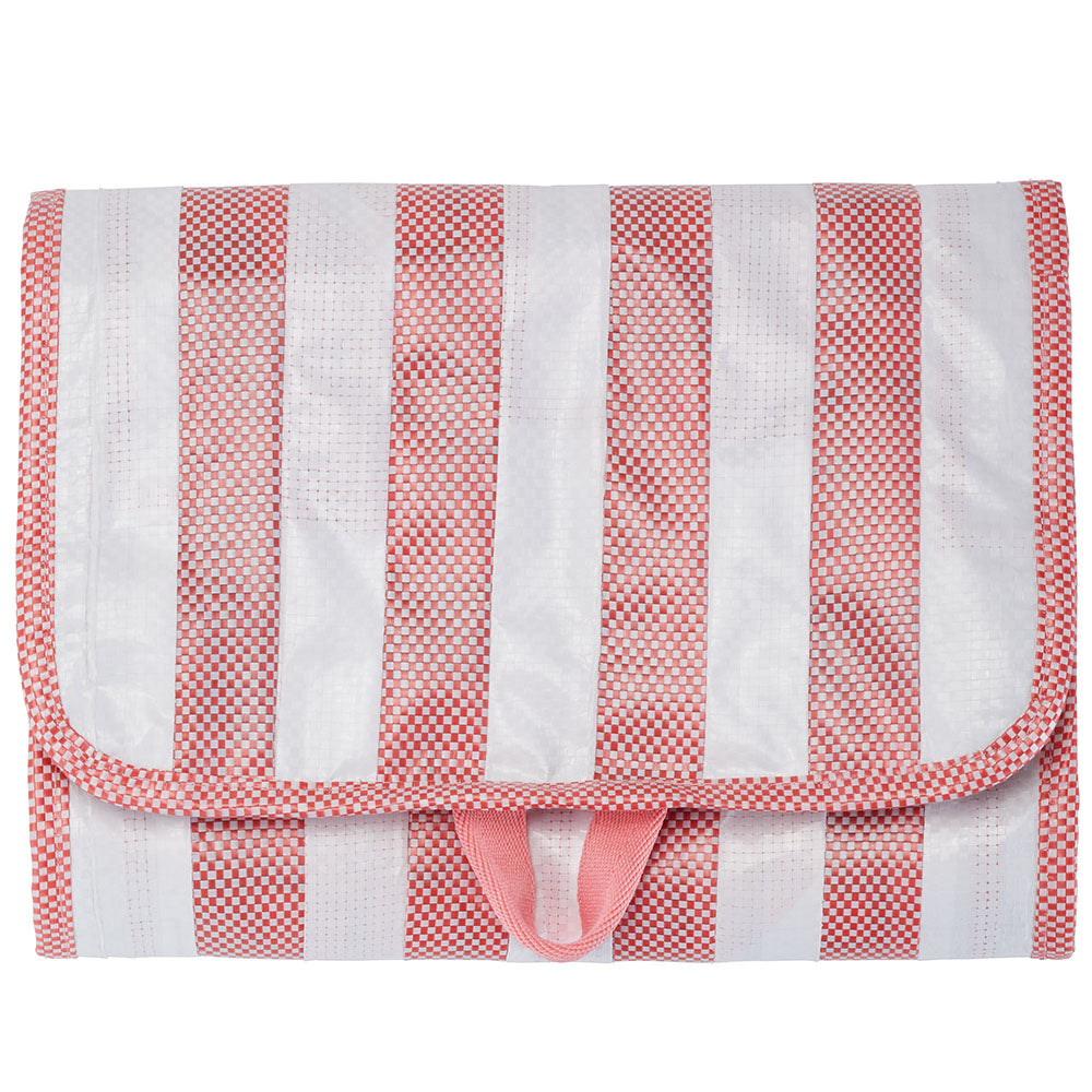 ungeöffnete Kulturtasche, weiß-rosa gestreift. Vorderansicht