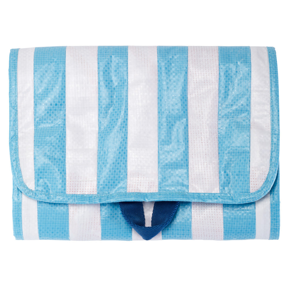 Toiletry bag, closed, front view. The hanging loop is in a darker blue colour.