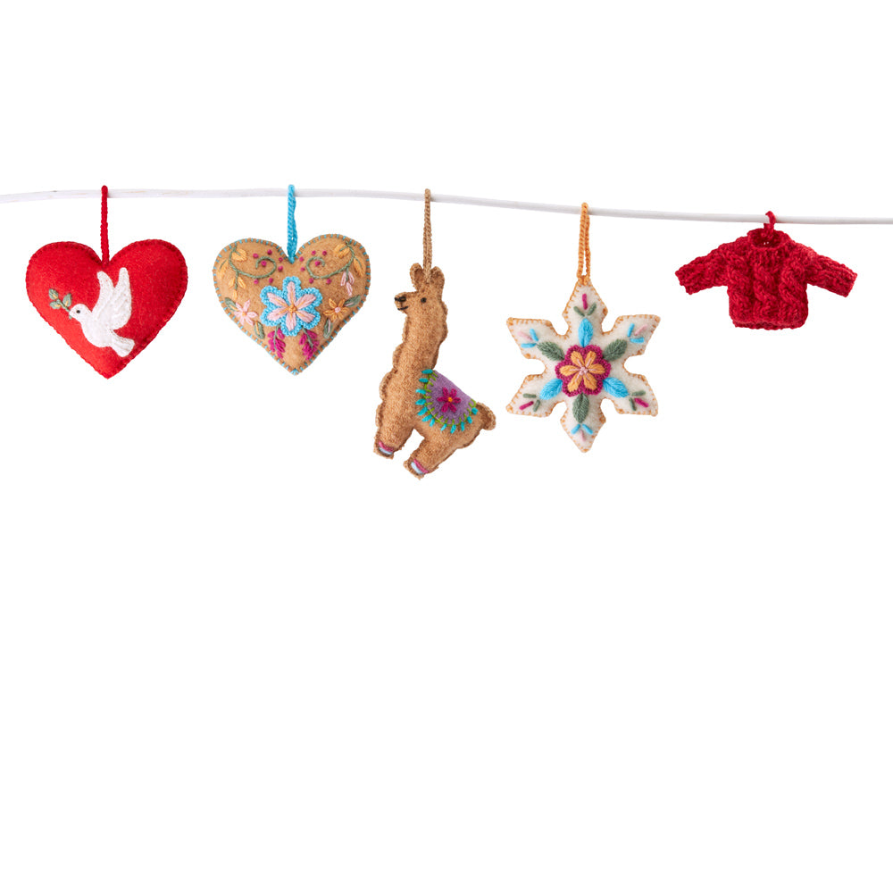 Pendant in the shape of a small sweater hanging from a branch.