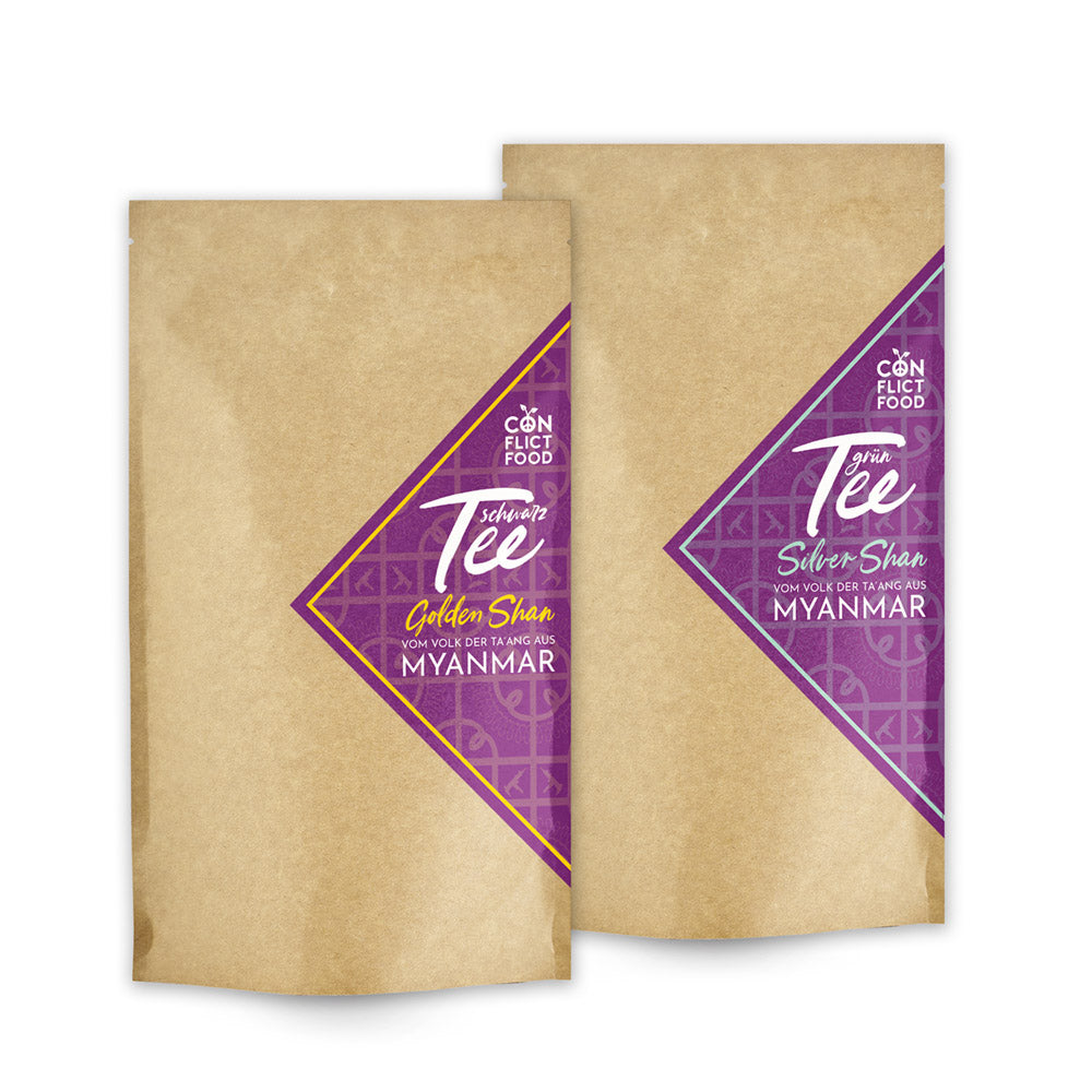 zwei braune Tütchen mit lila Etikett