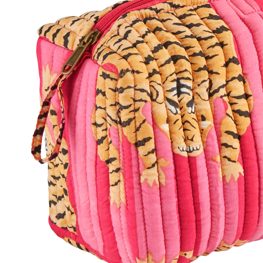 Toiletry bag in pink with eye-catching tiger print.