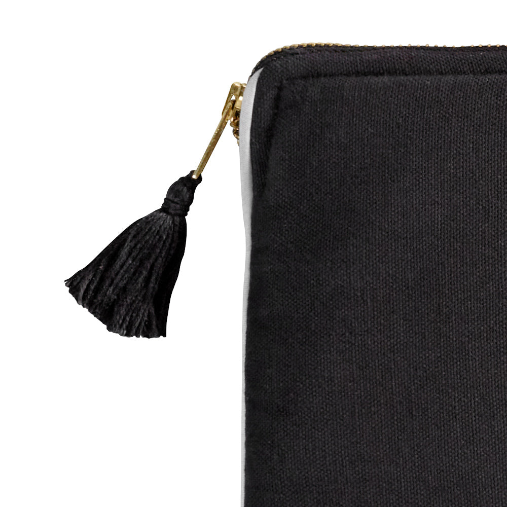 Detail of the tassel at the end of the zipper.