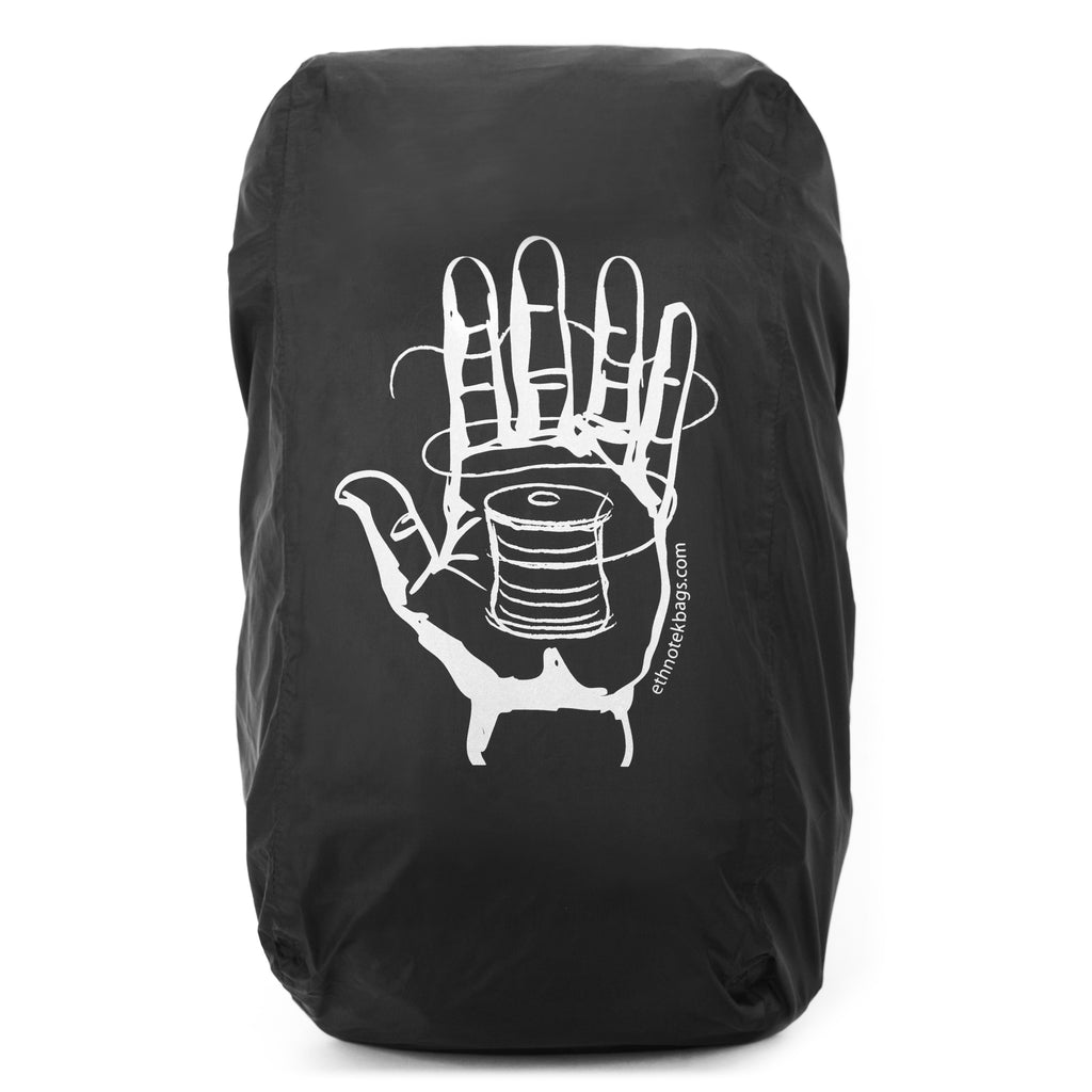 Black rain cover with a motif of an outstretched hand in the centre showing a spool of thread wrapped around the fingers. The motif is in the colour white