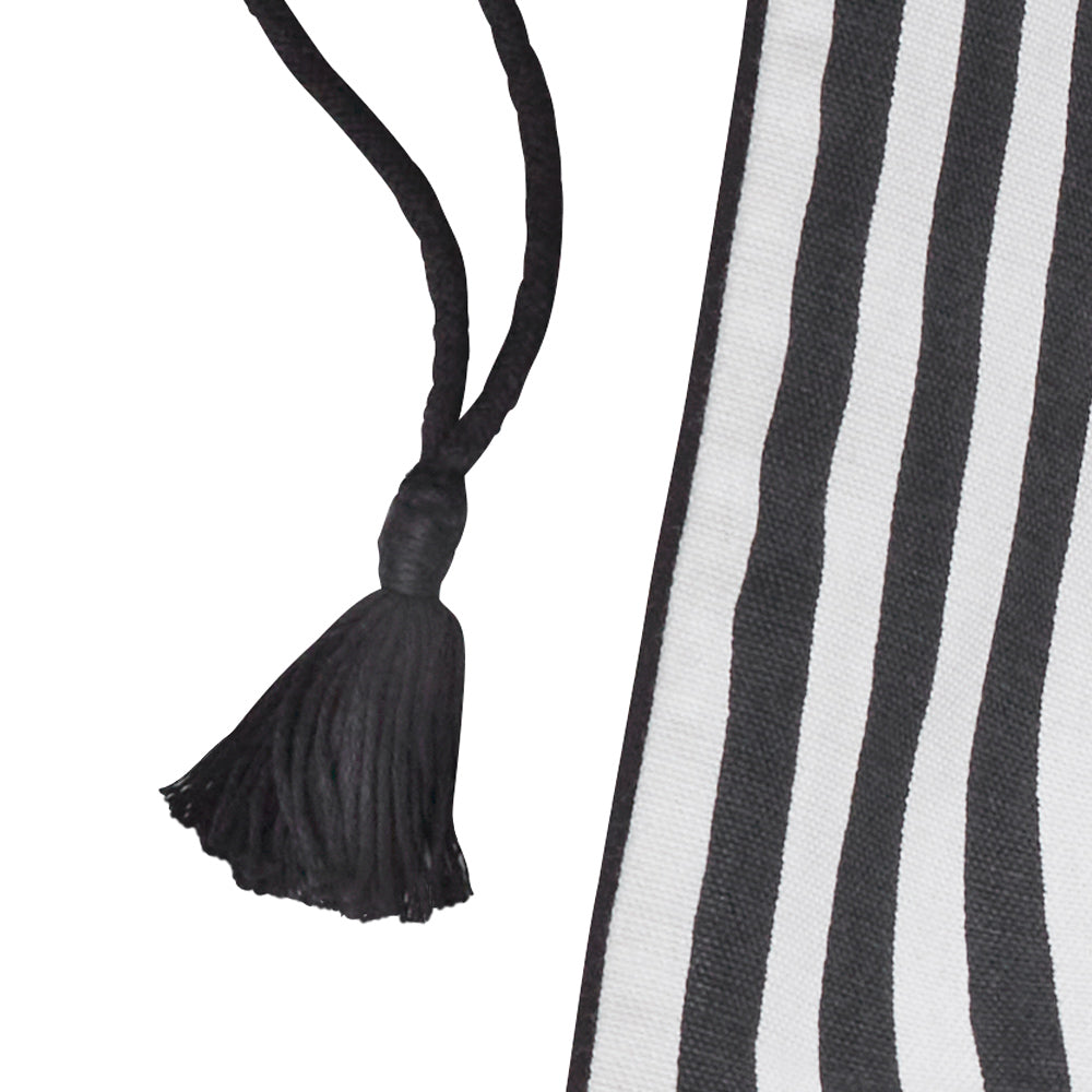 Detail of one of the black tassels