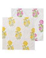 Serviette mit gelbem Motiv ausgebreitet , dahinter versetzt die Serviette mit rosa Motiv.