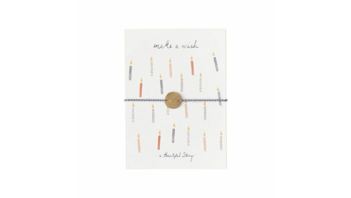 greeting card with bracelet, candles