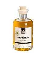 Bottle of Moringa care oil with a cork stopper