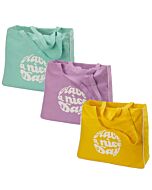 drei  Canvastaschen mit  weißer  Aufschrift in den Farben Mint, Lila und Gelb