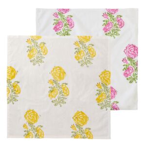 Serviette mit gelbem Motiv ausgebreitet , dahinter versetzt die Serviette mit rosa Motiv.